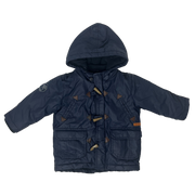 Campera azul con capucha y piel T. 6 a 12M